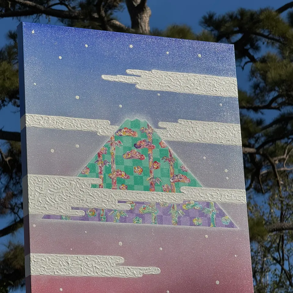 A layered landscape painting with a central green hill beneath bands of blue, pink, and white.