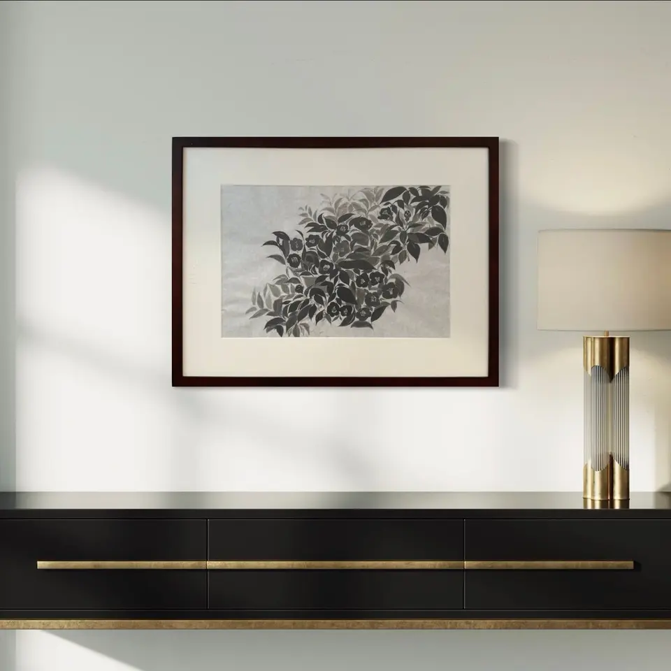 A framed black ink drawing of branching foliage on pale rice paper.
