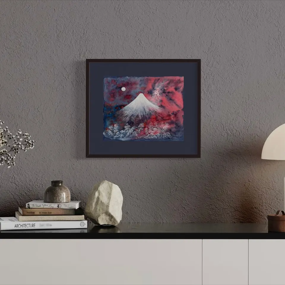 A framed painting of a pink and blue fish against a dark background.